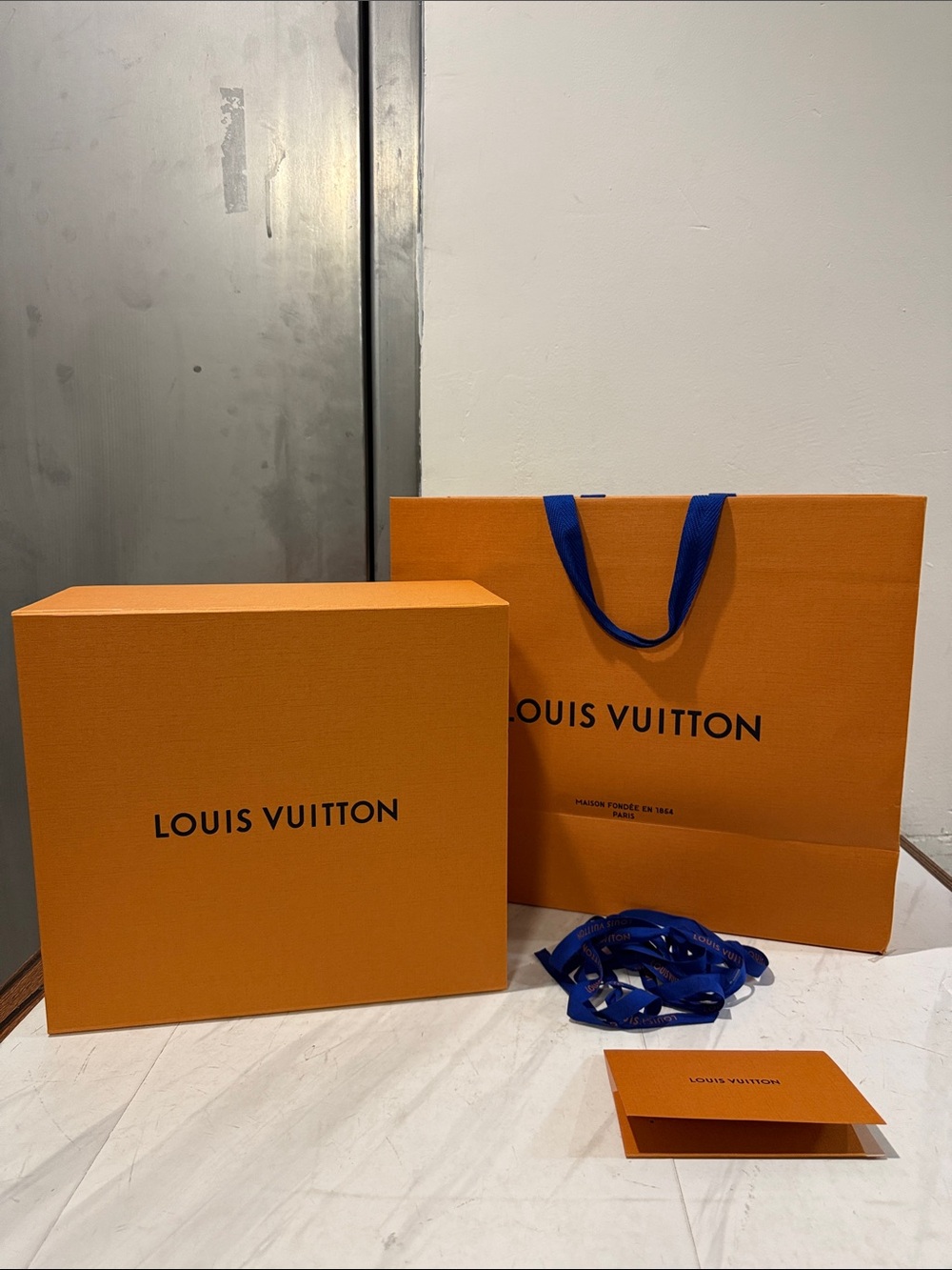 Louis Vuitton Shopping Bag, Box, Ribbon & Receipt Sleeve (all for $50)